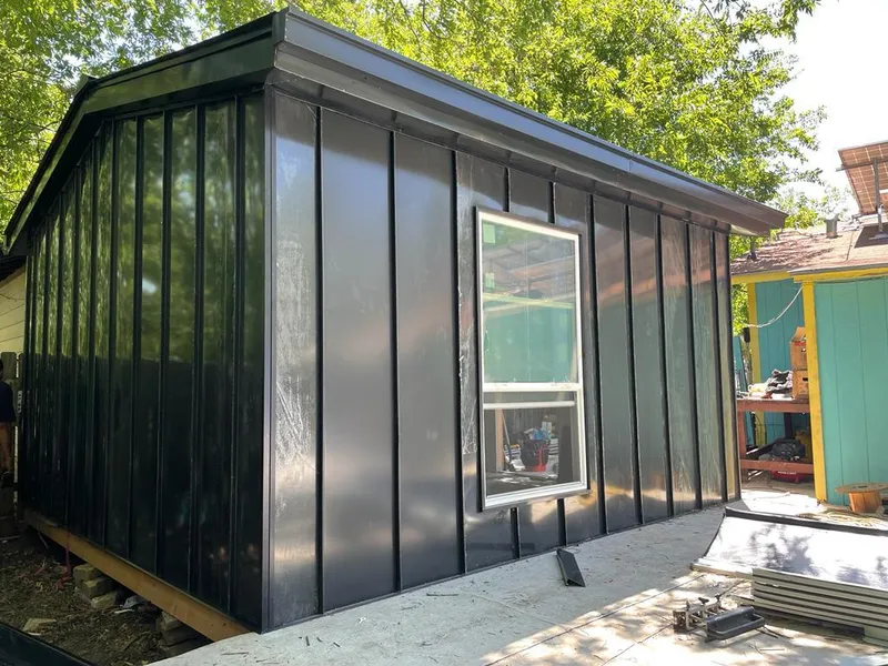 Black standing seam metal wall panels for Metal Roof Installation in Evansville