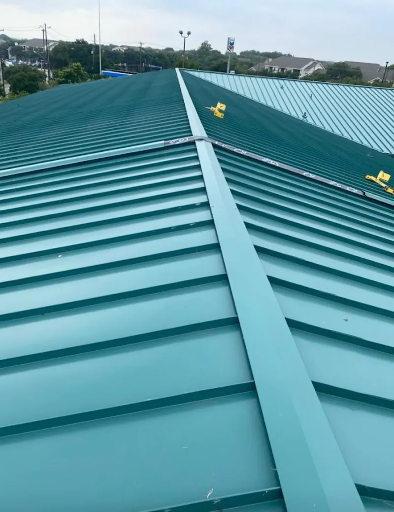 Green commercial metal roof ridge and valley for Metal Roof Repair in Evansville